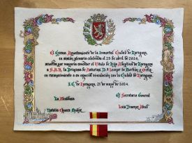 Diploma acreditativo, en pergamino, de la concesión del Título de Hija Adoptiva de Zaragoza a S.A.R. la Princesa de Asturias, Dª Leonor de Borbón y Ortiz.